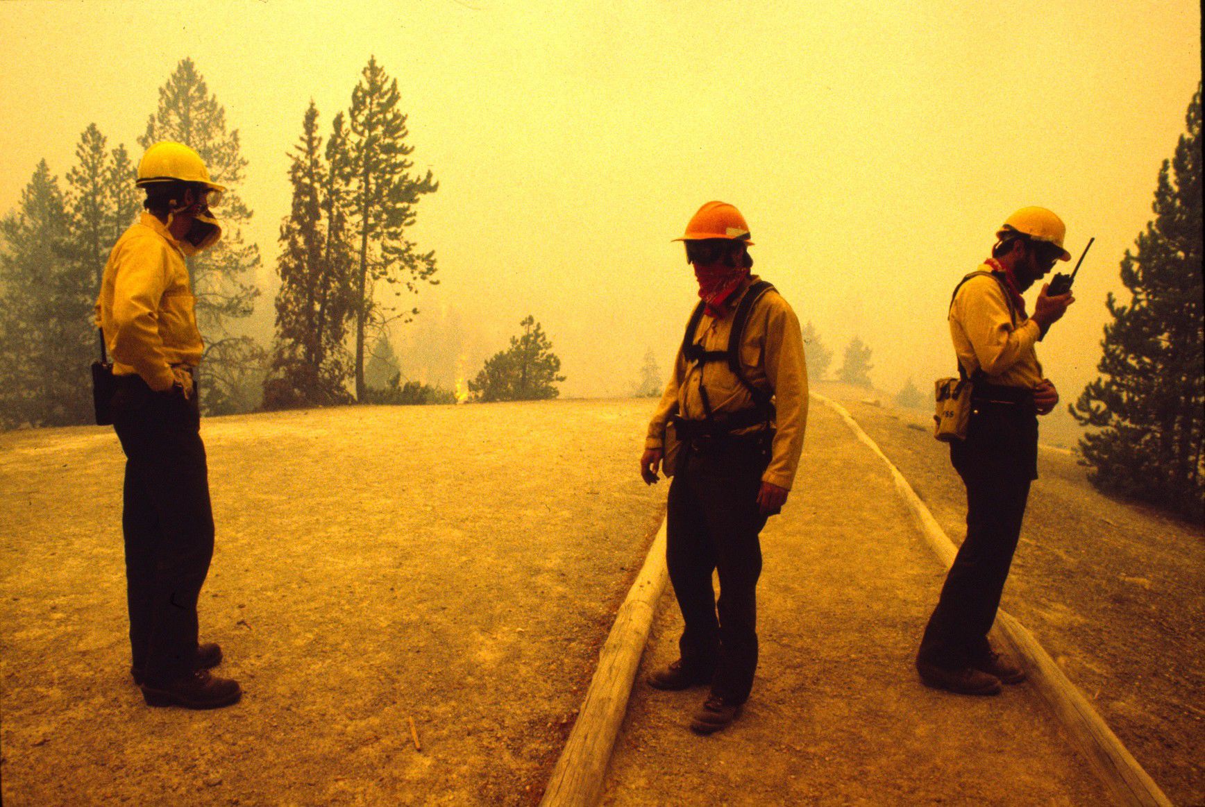 Firefighters in heavy smoke at Norris Geyser Basin